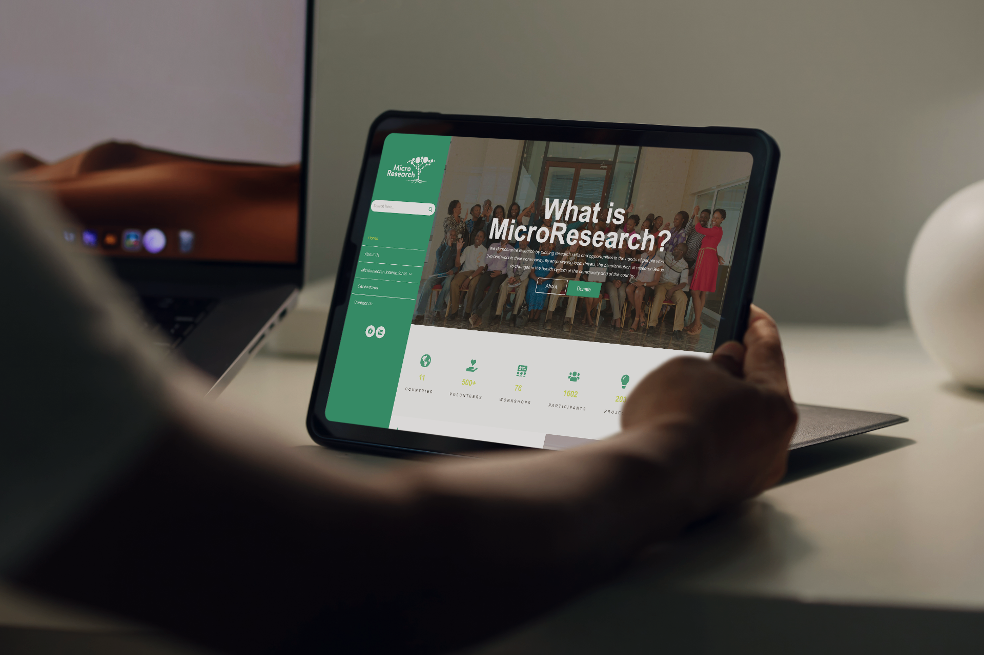 MicroResearch.ca website displayed on a tablet